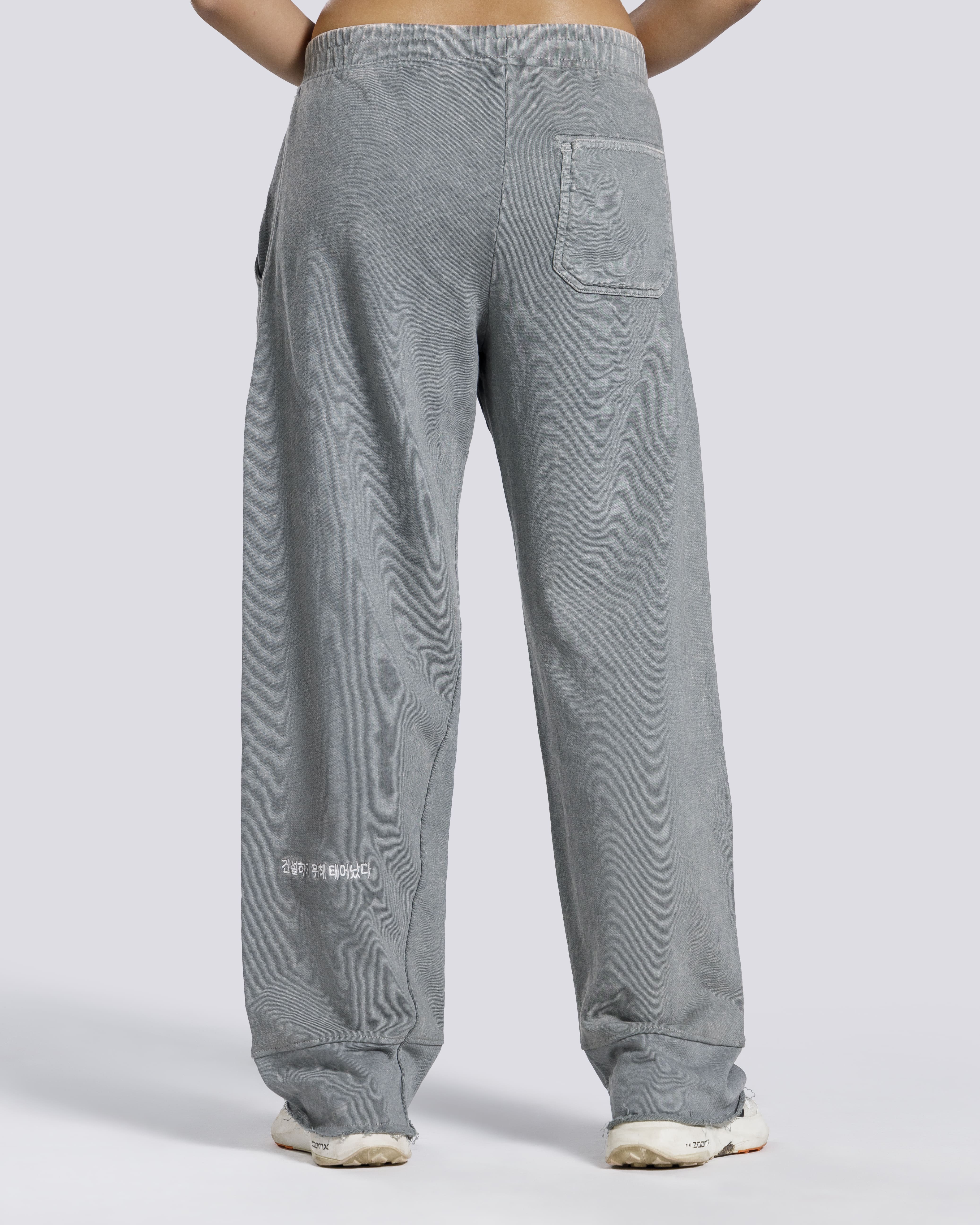 Women elastic waist washed trousers back view grey Pakistan
