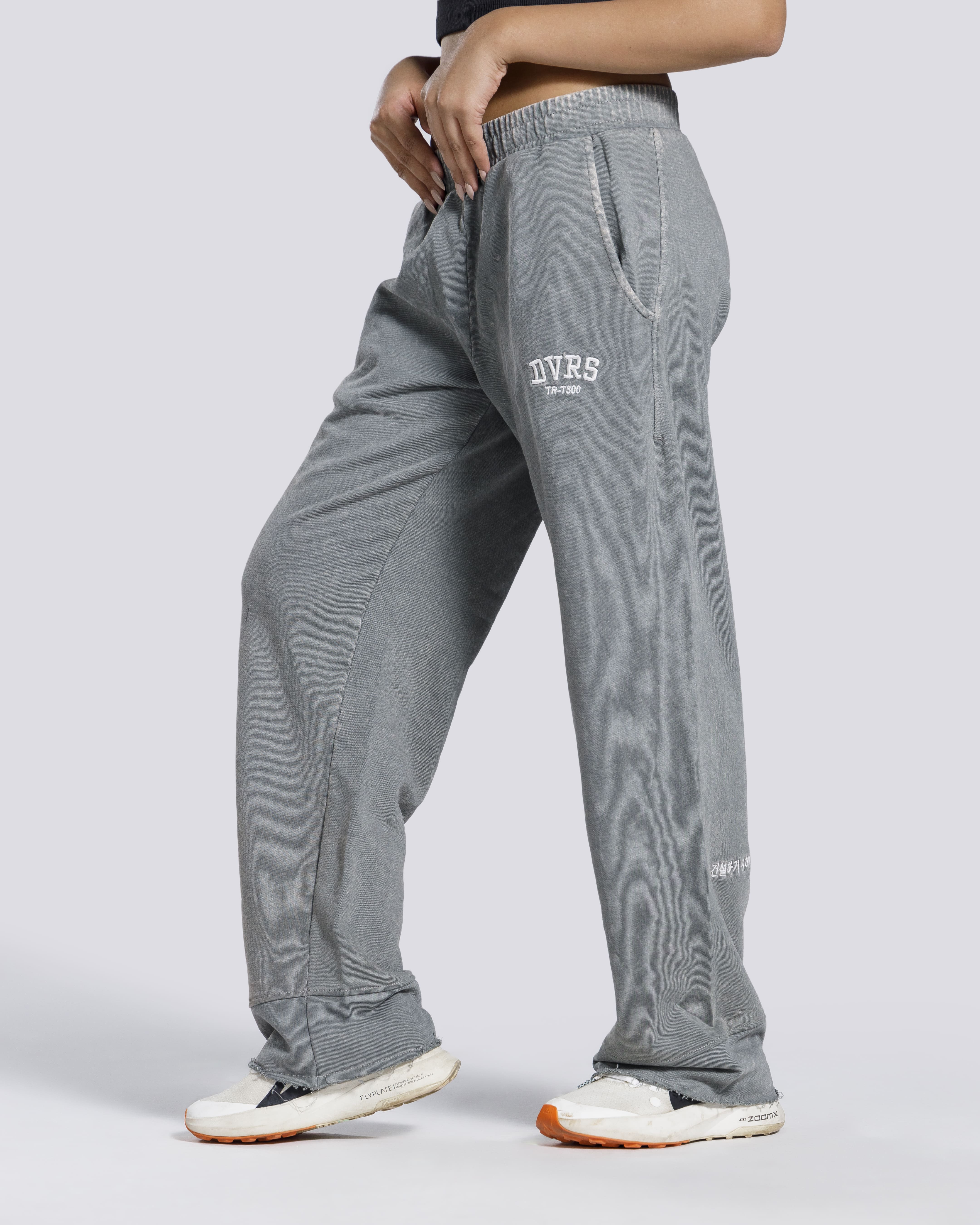 Women straight leg gym trousers side view grey Pakistan