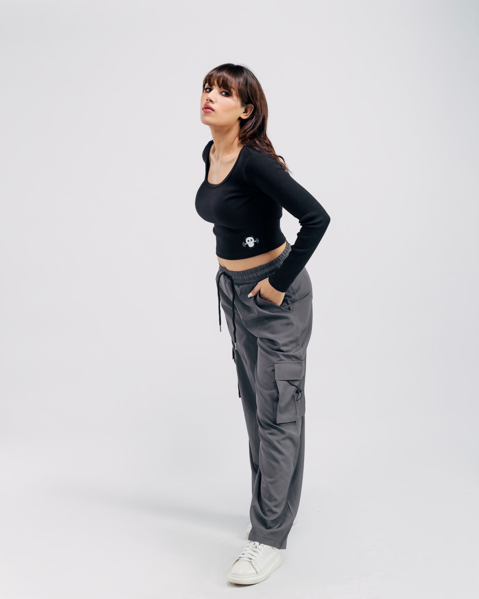 Walking view Grey oversized cargo pants women