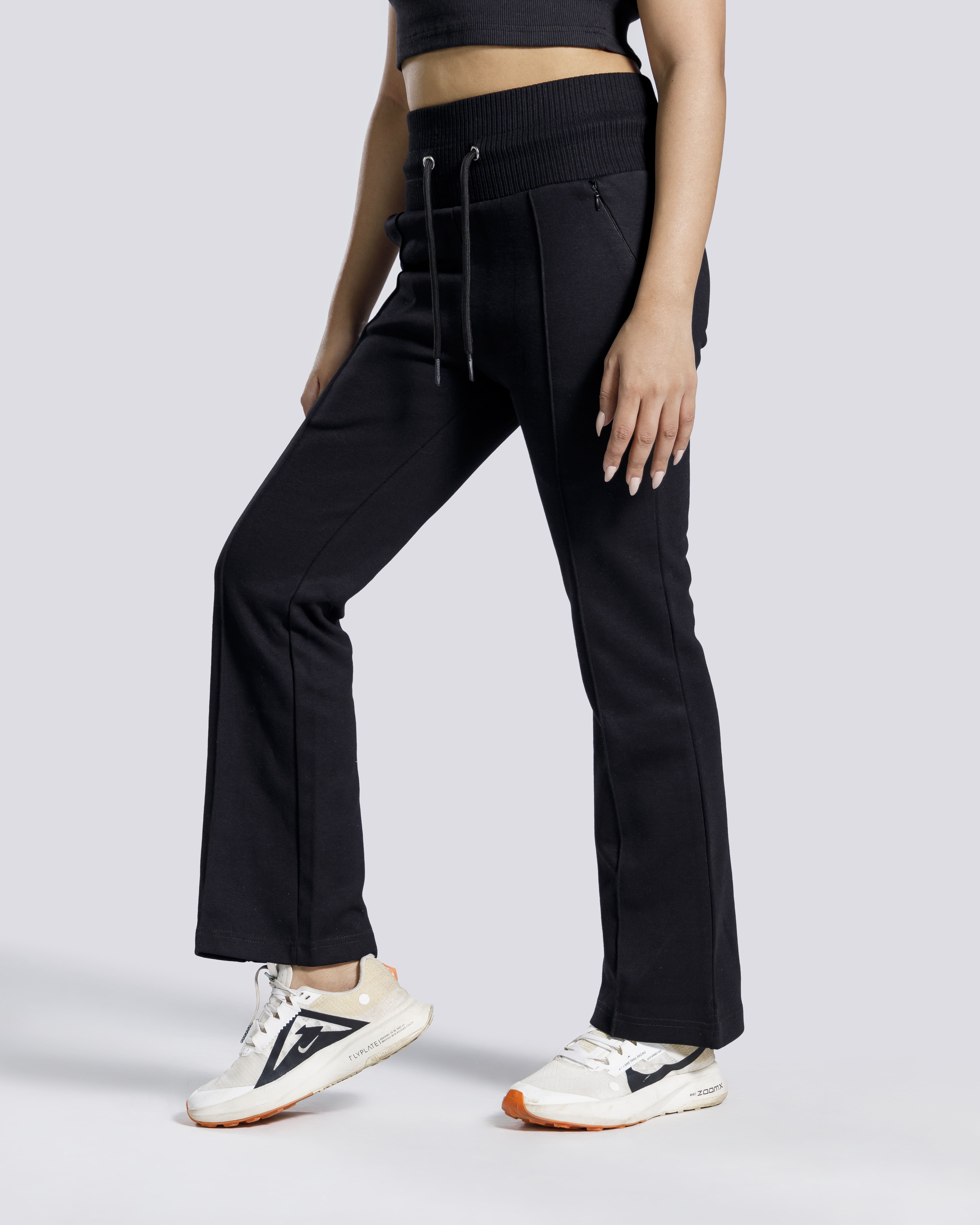 Women flared gym trousers side view black Pakistan